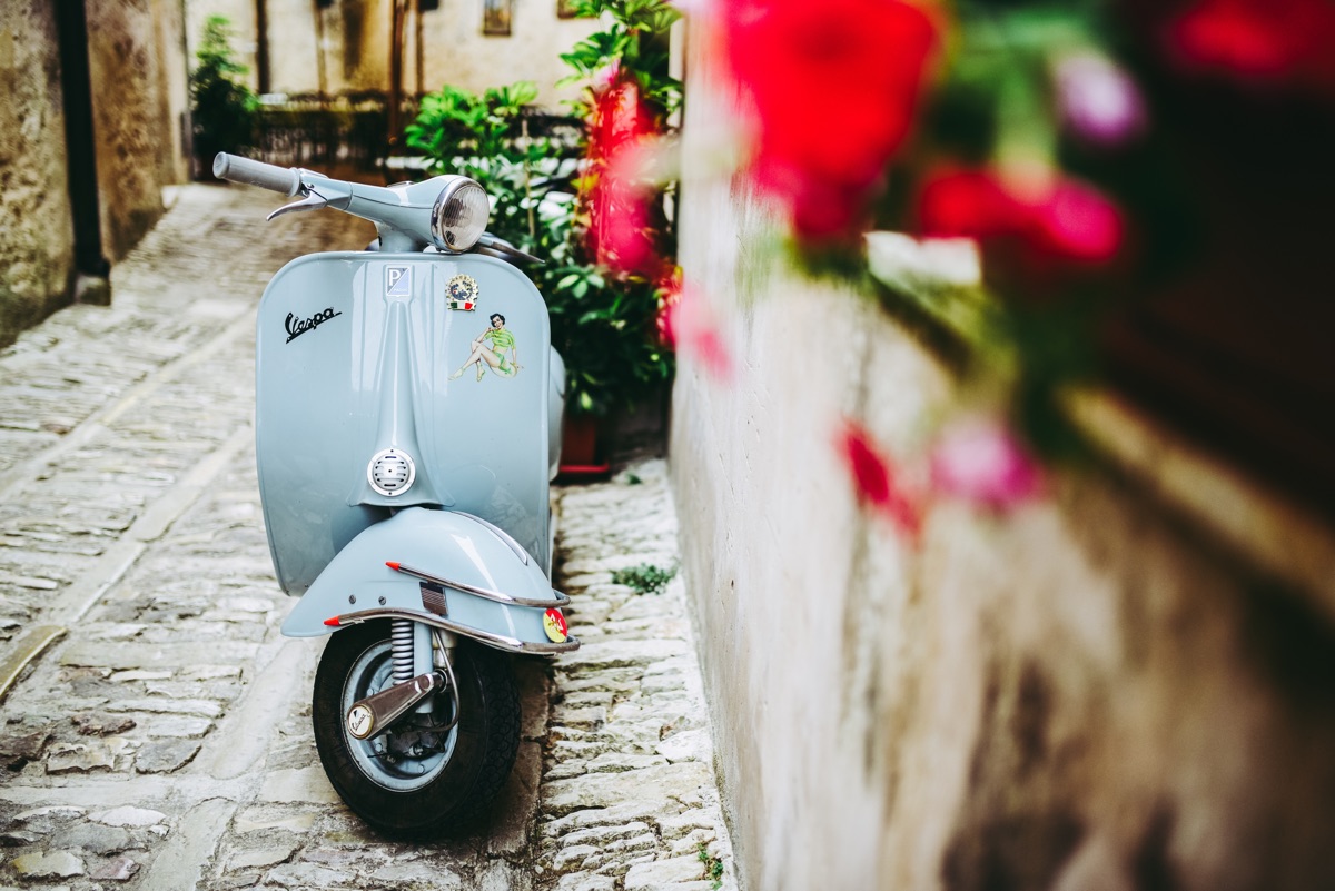 Classic Vespa scooter in an Italian street